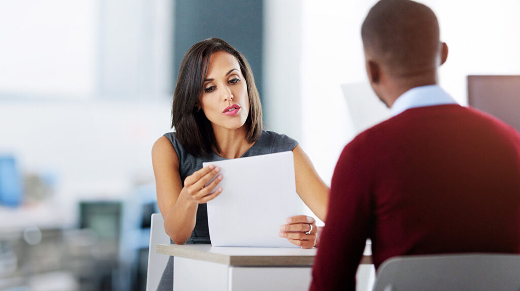 business-interview-woman-office-with-resume-cv-man-with-human-resources-contract-agreement-information-hiring-recruiting-professional-job-position-discussion-meeting