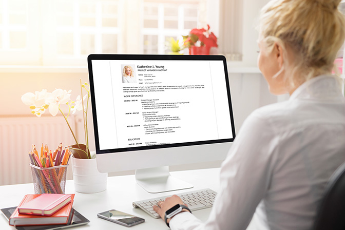 woman-creating-her-cv-computer-all-contents-document-are-made-up Resume Writing Services